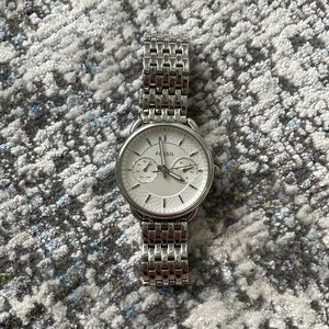 Silver fossil watch